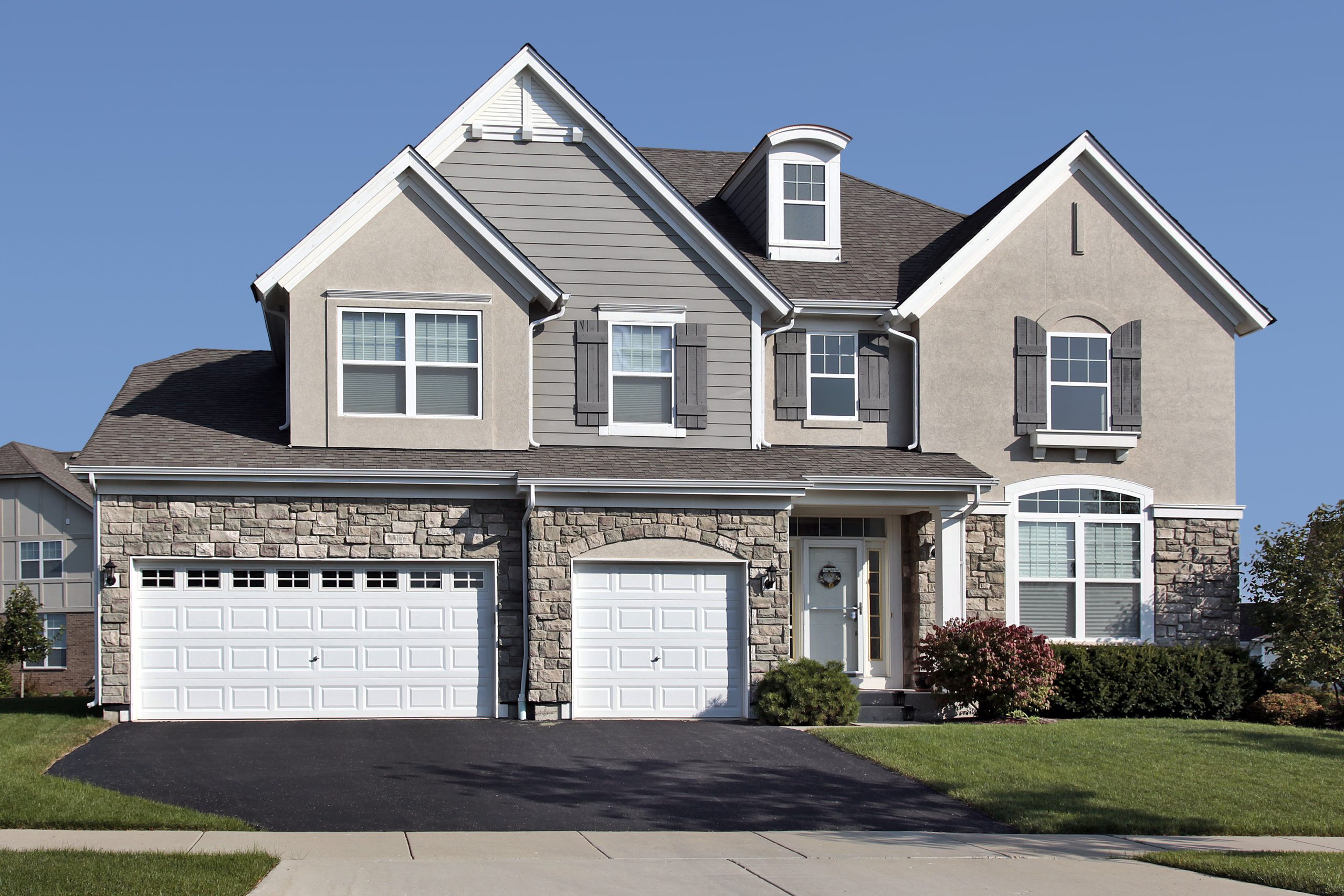 Home in suburbs with three stall garage Home in suburbs with three stall garage