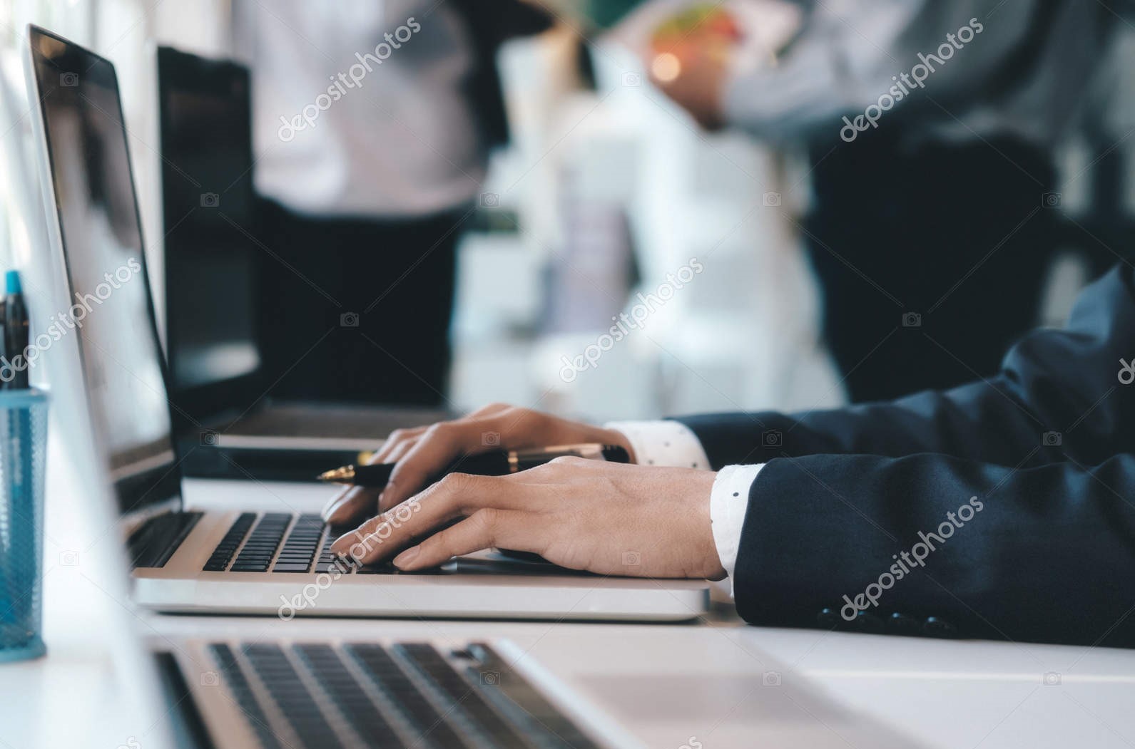Businessman using computer to analyse the investment. Businessman using computer to analyse the investment.