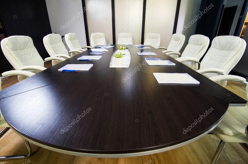 depositphotos_98886938-stock-photo-conference-room-with-big-round Conference room with big round table and chairs